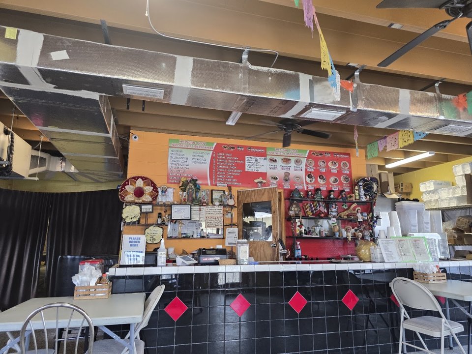 Casual dining space with colorful Mexican decor accents.