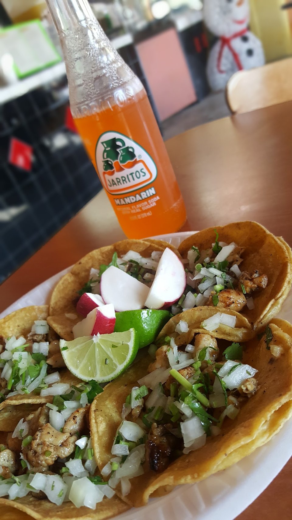 Assorted Mexican entrees served on colorful plates.