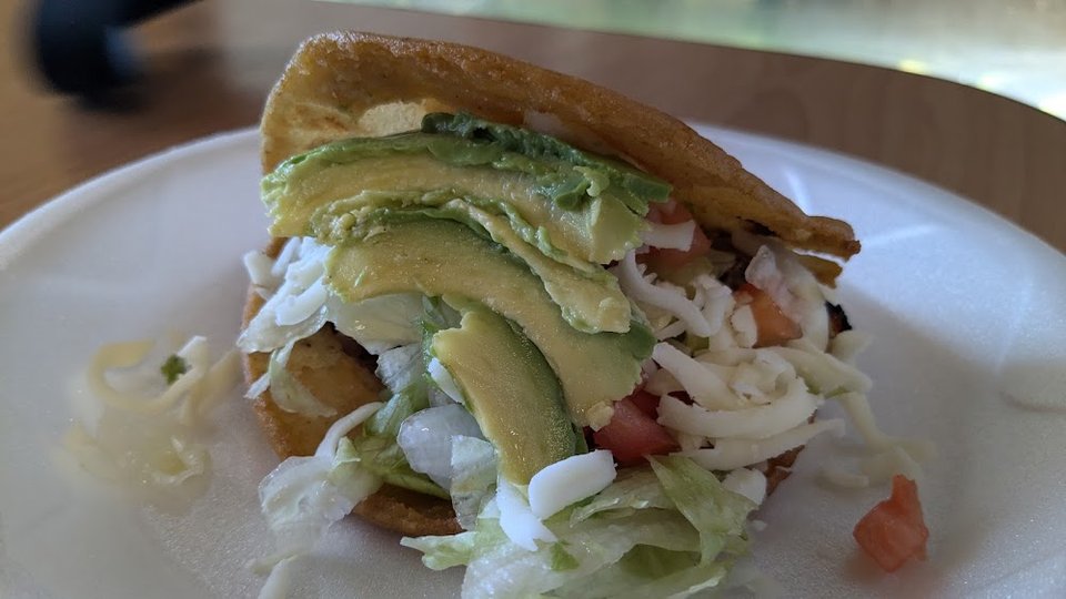 Menu-style spread of tacos, burritos, and ceviche.