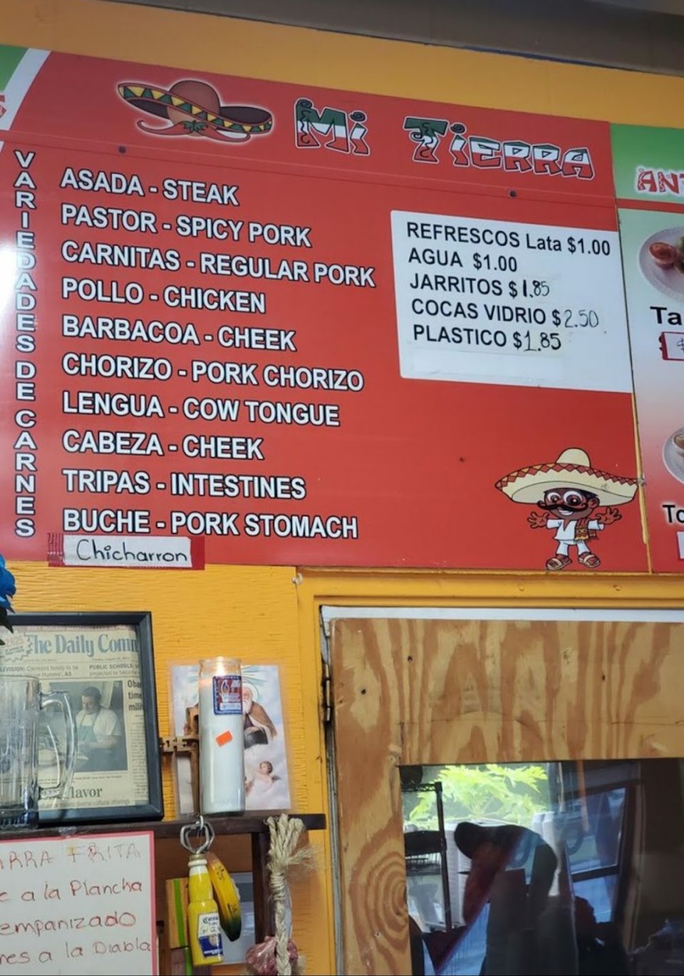Close-up of carne asada, tamales, and tortas.
