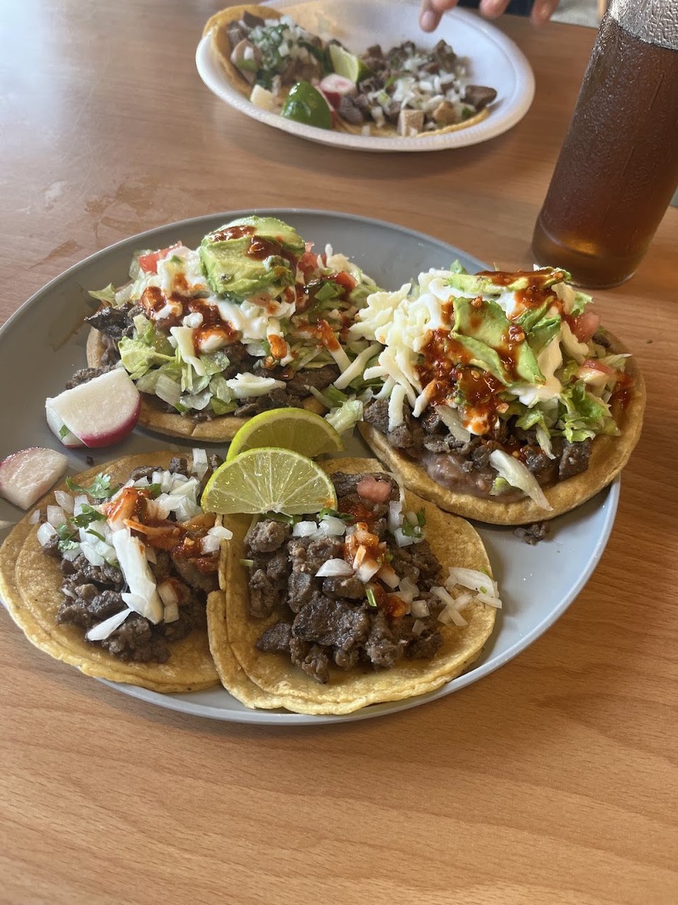 Menu-style spread of tacos, burritos, and ceviche.